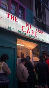 The Piecrust Café neon storefront on Stratford High Street